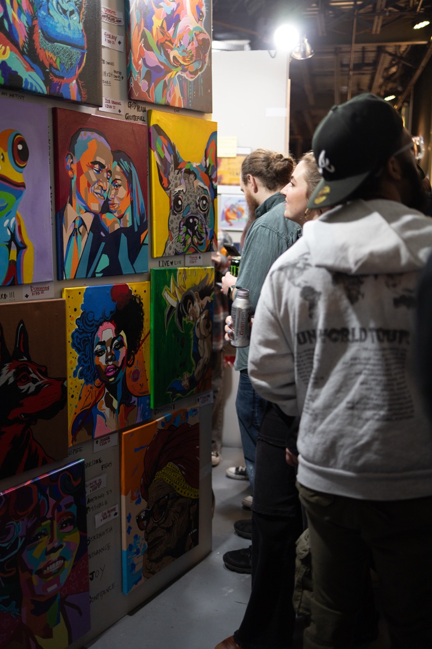 Browsing the vendor wall at Pancakes & Booze